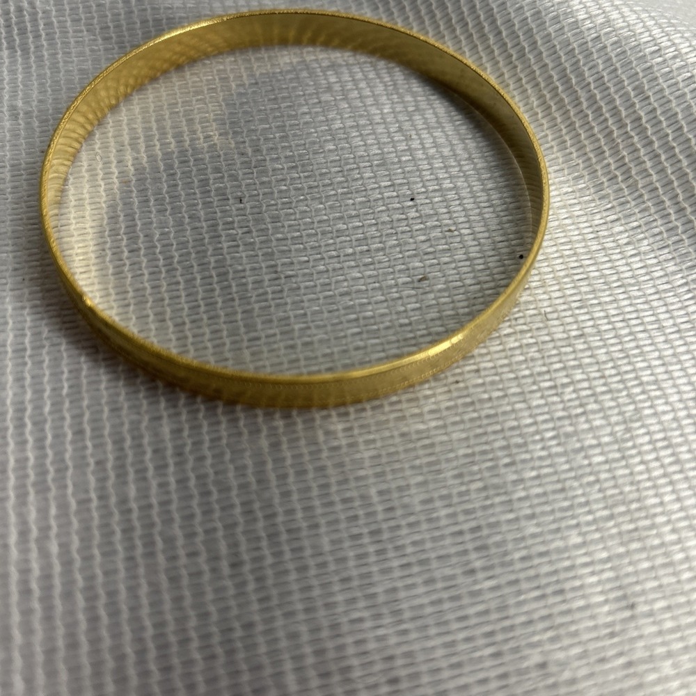 Gold Tone Heart Engraved Bangle Bracelet Measuring 2 3/4 Inches Across